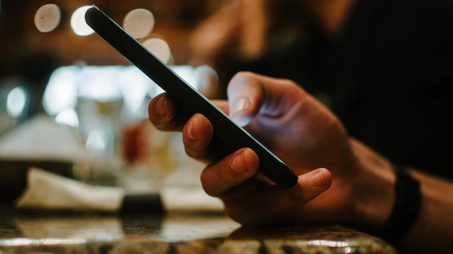 Close-up of a hand holding a phone