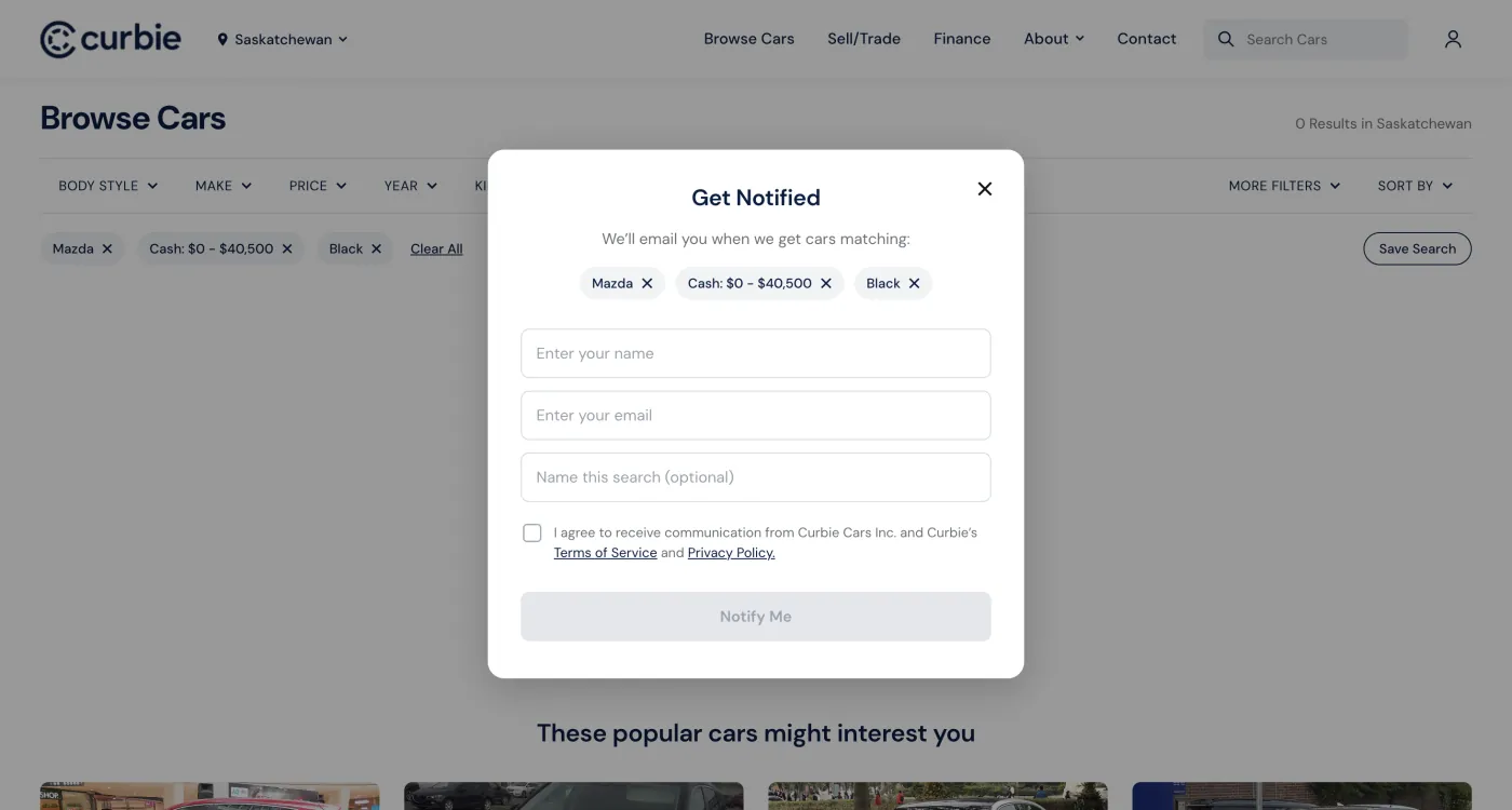 Shipped desktop no-results state: with Mazda, a price range, and Black applied, a Get Notified modal lists the active filters and asks for a name, email, and optional search name, with popular cars suggested below